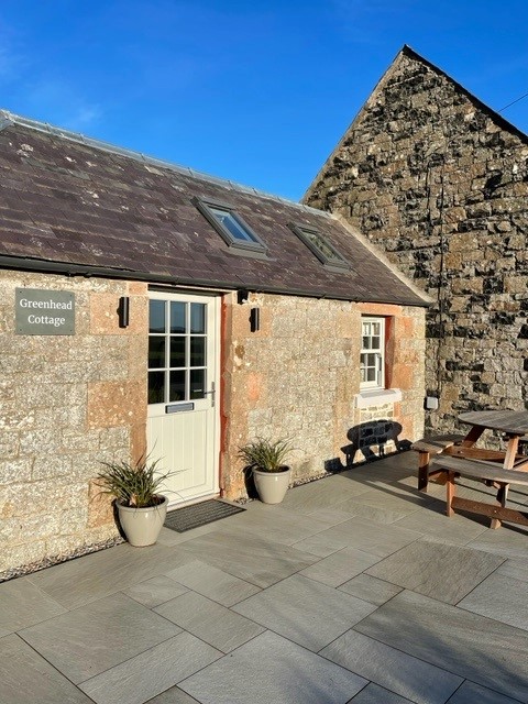 Quickslide's uPVC sash windows and French doors bring sleek, modern style to a Kelso holiday cottage
