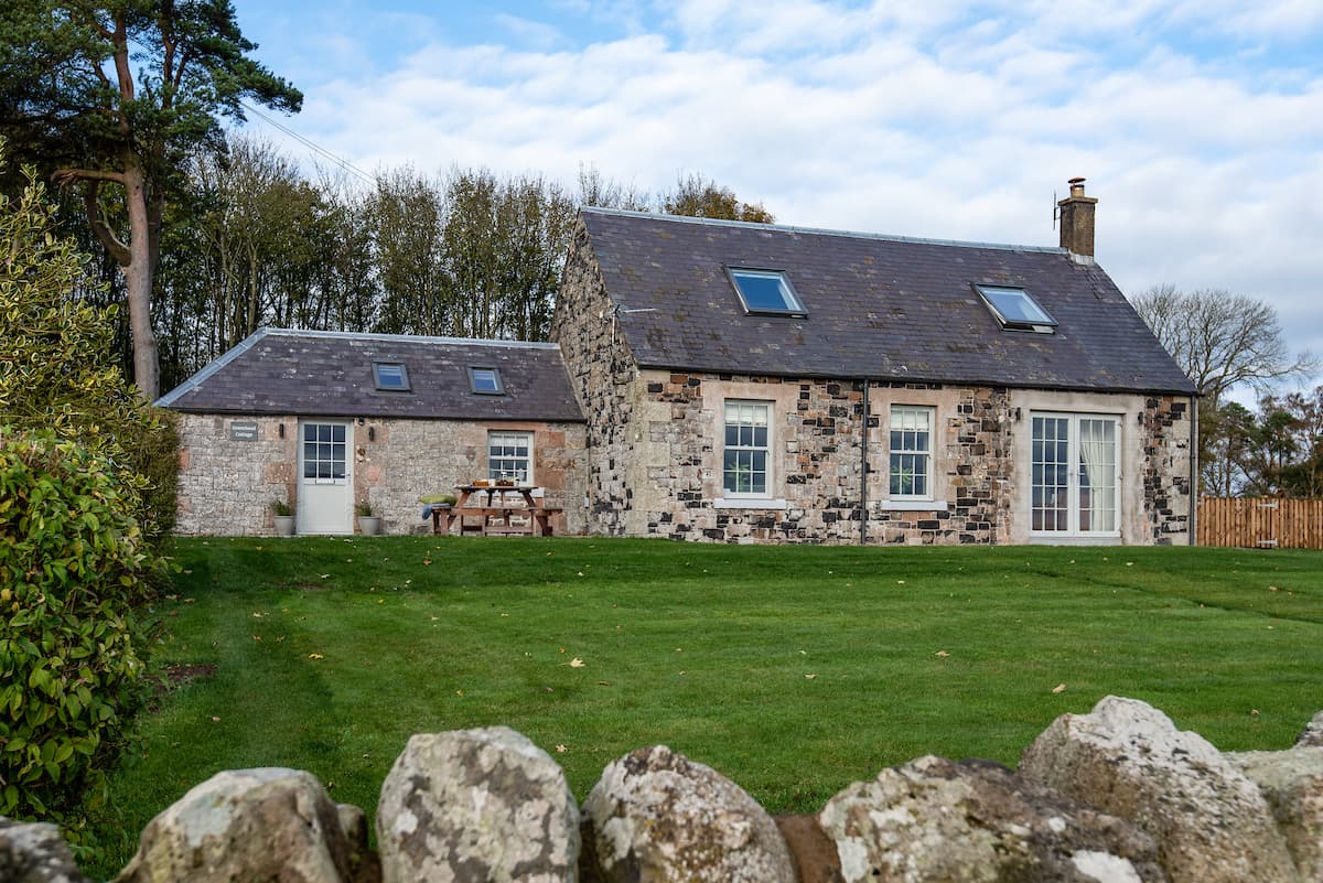 Modern uPVC windows and doors from Quickslide refresh a renovated holiday cottage near Kelso, Scotland