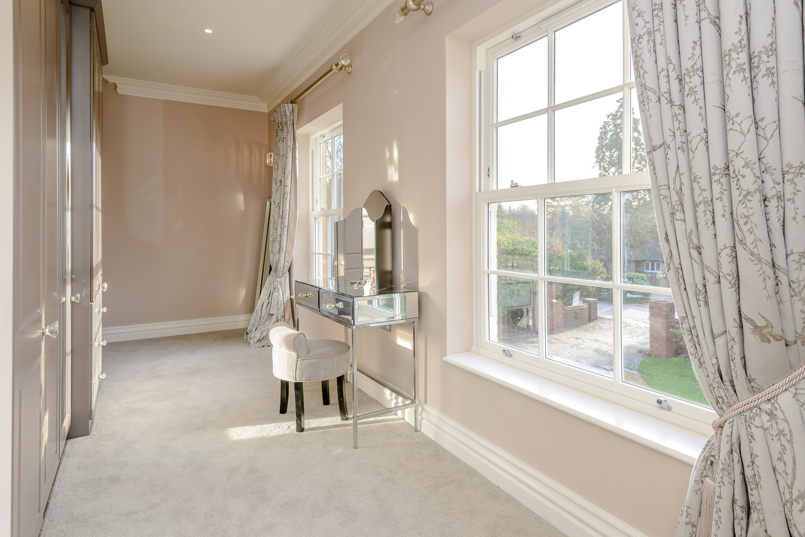 Hertfordshire home with classic wood grain uPVC windows by Quickslide, offering charm, efficiency, and low upkeep