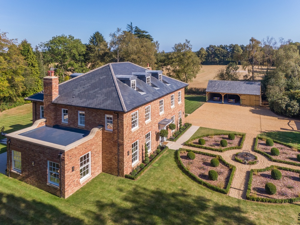 Elegant 5-bed Hertfordshire home with handmade brickwork and period-style windows by Quickslide