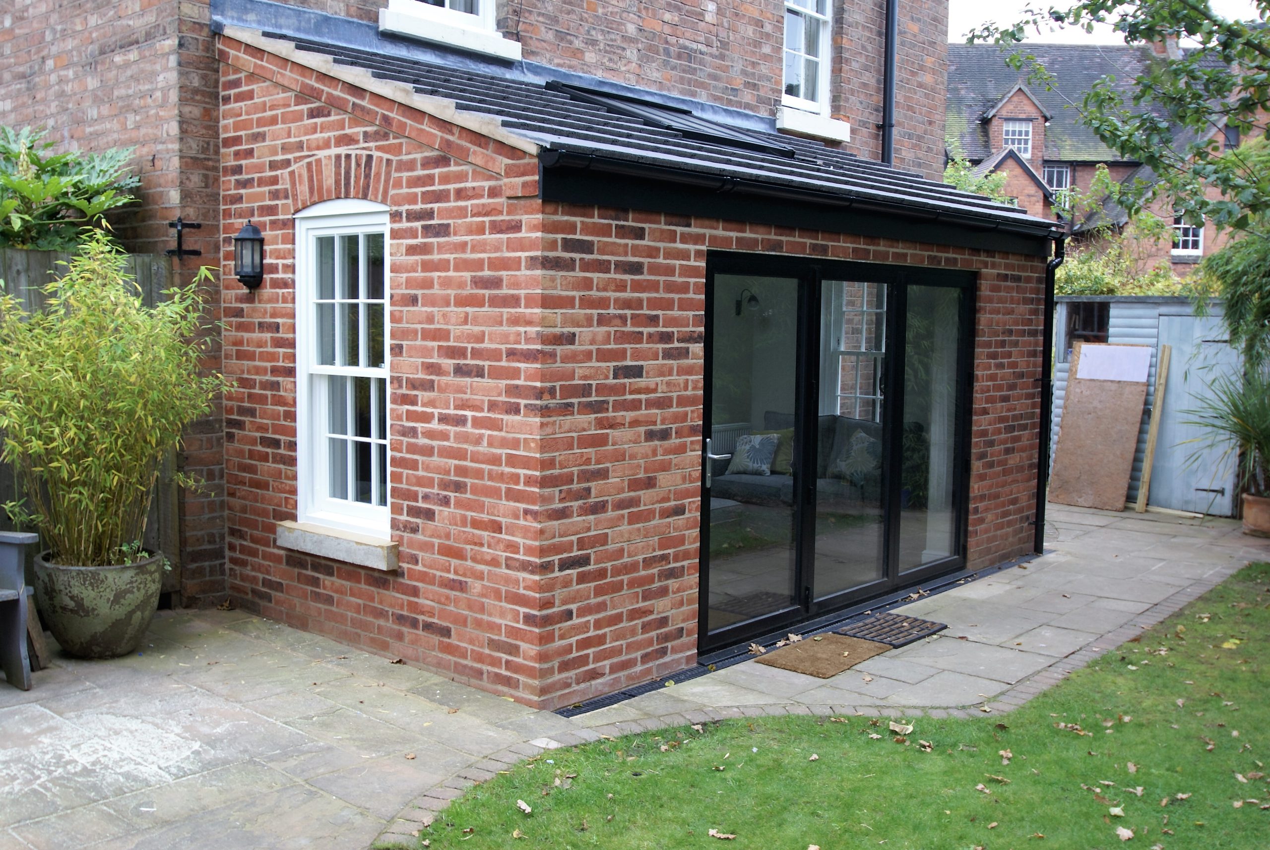 Slim aluminium bifold door frames with black finish