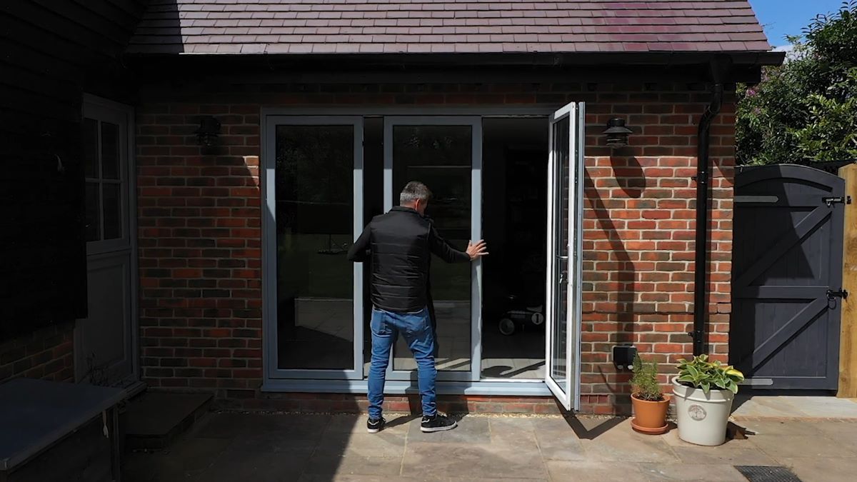 The Quickslide Quick-Glide, a cutting-edge door system with a slim slide and stack mechanism, enhancing both aesthetics and functionality