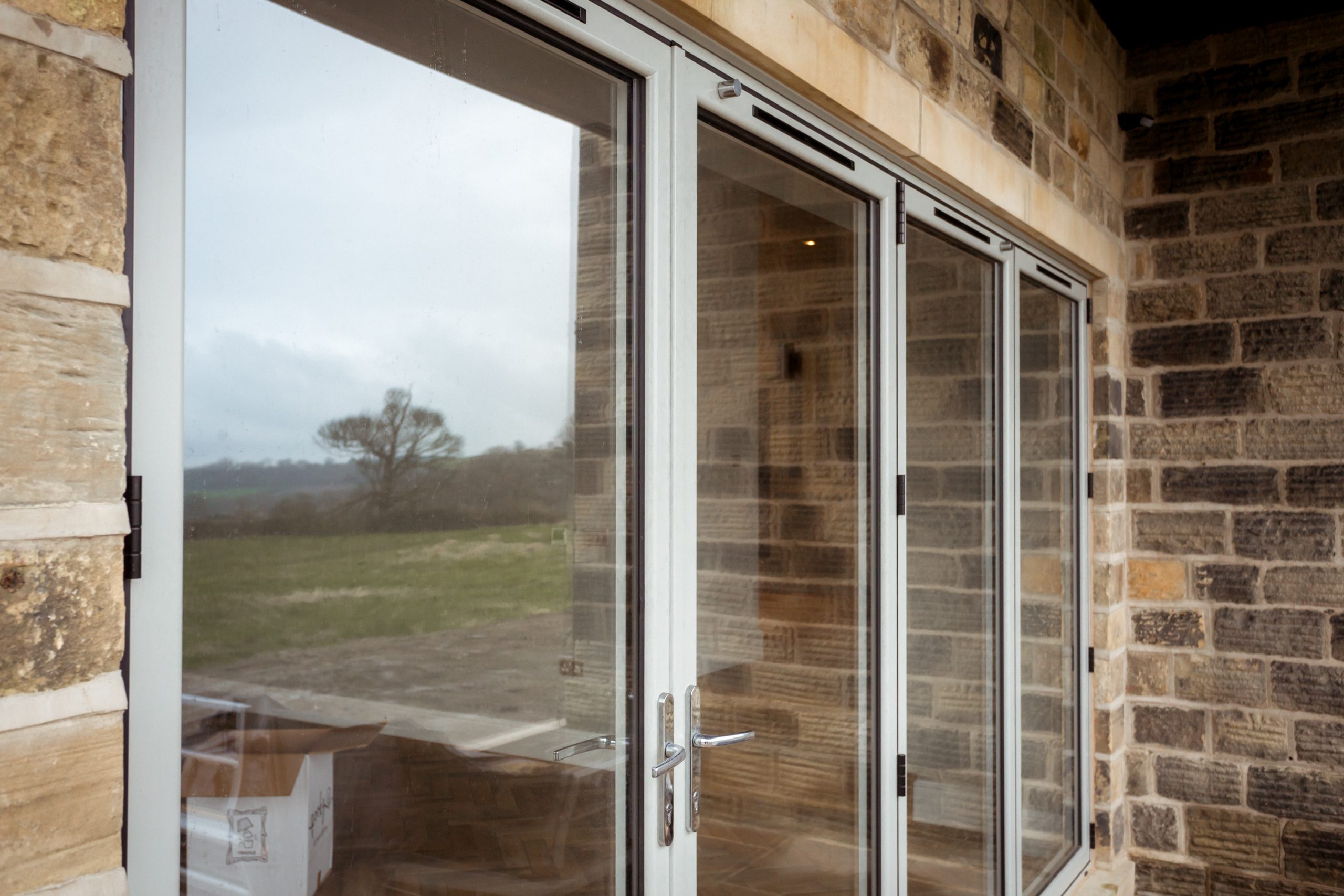 Aluminium bifolding doors showcasing functionality and style in the farmhouse