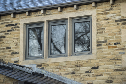 Durable aluminium windows with glass supplied loose, ensuring easy installation and transport