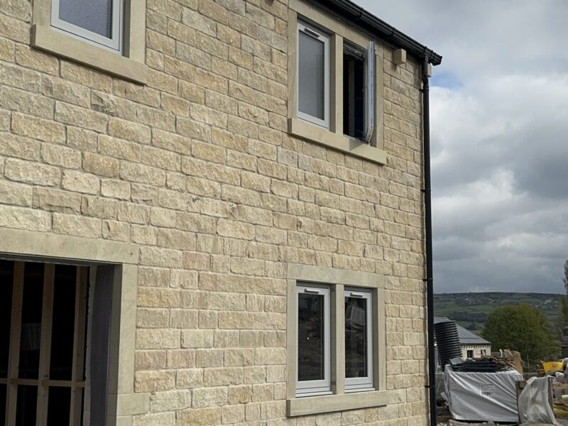Design-led new homes with flush windows and sliding doors by Quickslide