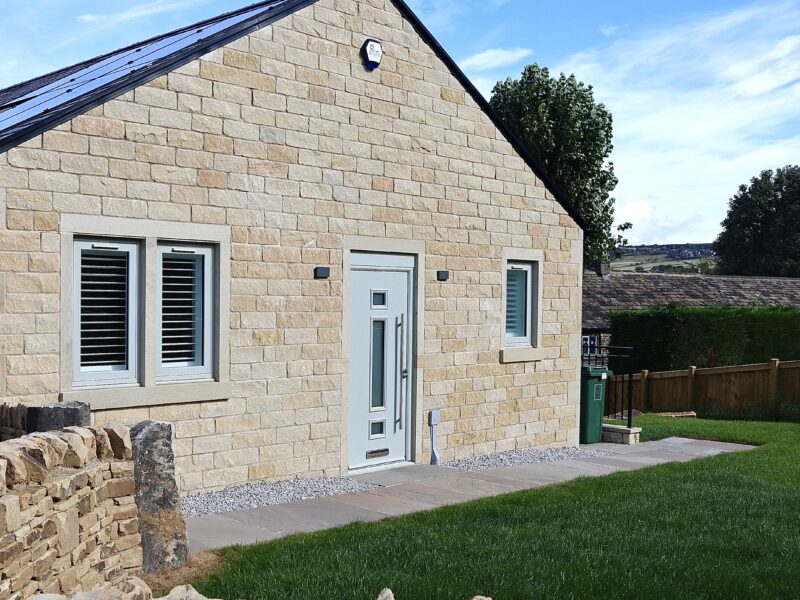 Contemporary homes by SB Homes showcasing agate grey windows and clean architectural lines