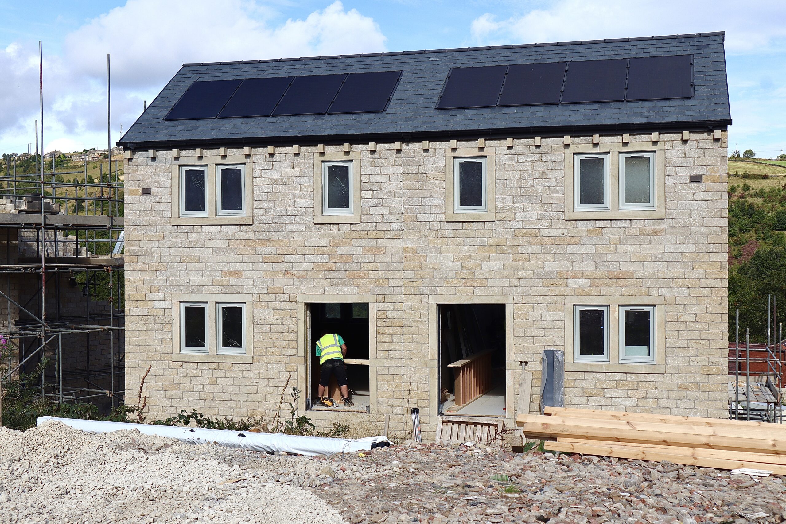 Premium new build homes at Lingards Fold featuring agate grey flush casement windows