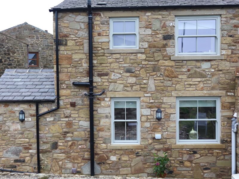 Traditional-style uPVC sash windows combining period design with modern performance