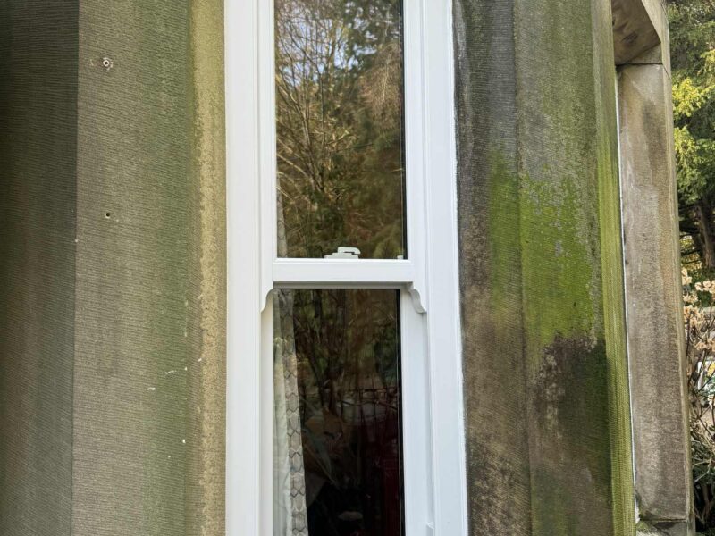 Slim midrail uPVC sash windows designed to match the traditional character of Stancliffe Hall
