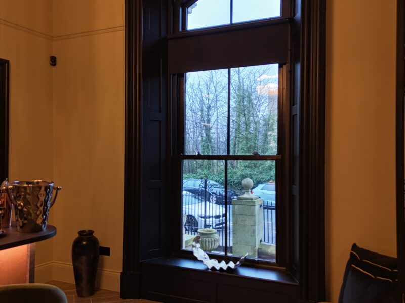 uPVC sliding sash windows with slim 37mm midrail for authentic proportions