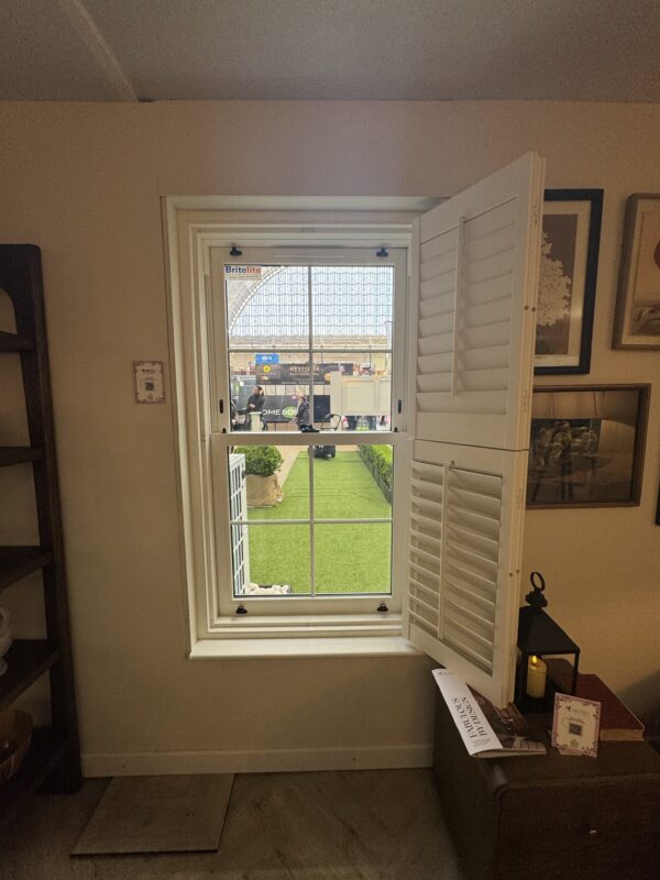 Modern country style show home featuring white woodgrain uPVC sliding sash windows
